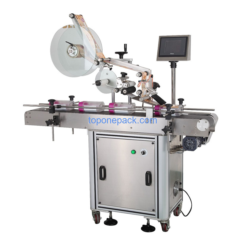 Flat surface labeling machine